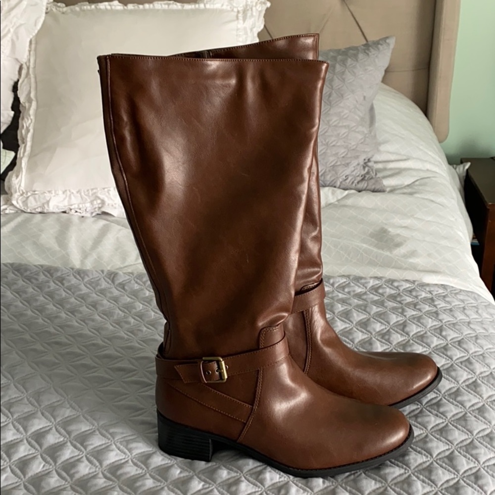 Brown riding boots.